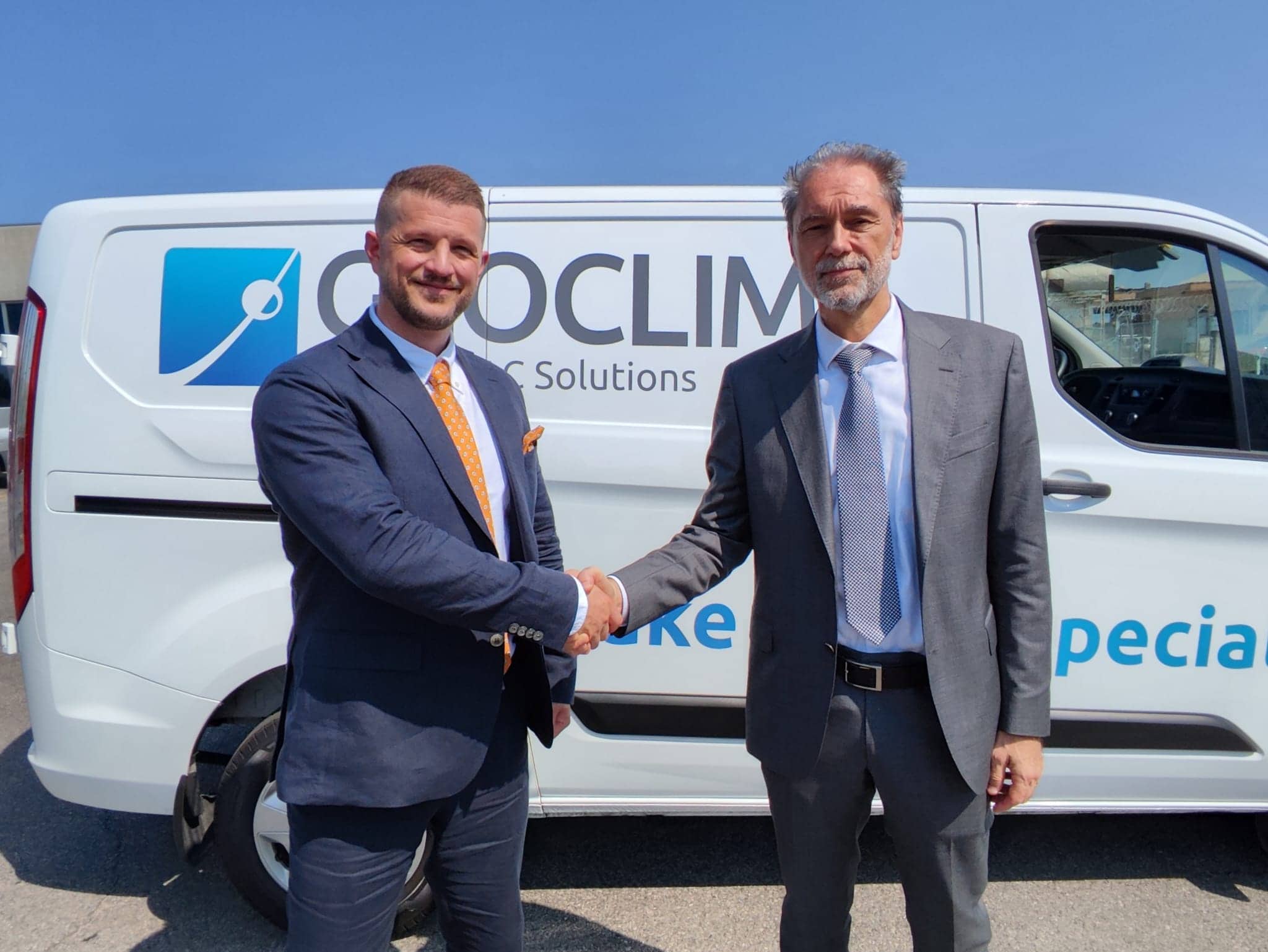 Stefan Aspman and Paolo Ferraris shaking hands after Geoclima acquisition by Munters